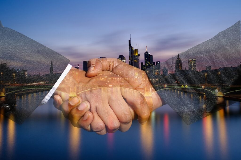 shaking-hands-handshake-skyline-3641642 shaking hands, handshake, skyline-3641642.jpg